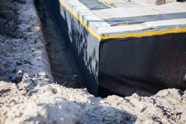 Professional Waterproofing technician working in Pine River, WI